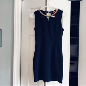 Bodycon dress with embellished neckline